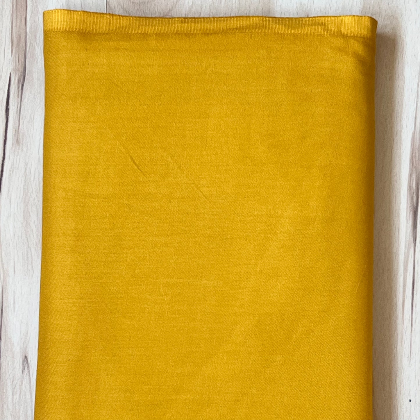 Tissu coton UNI JAUNE MOUTARDE 140 cm de large Coton vendu au mètre