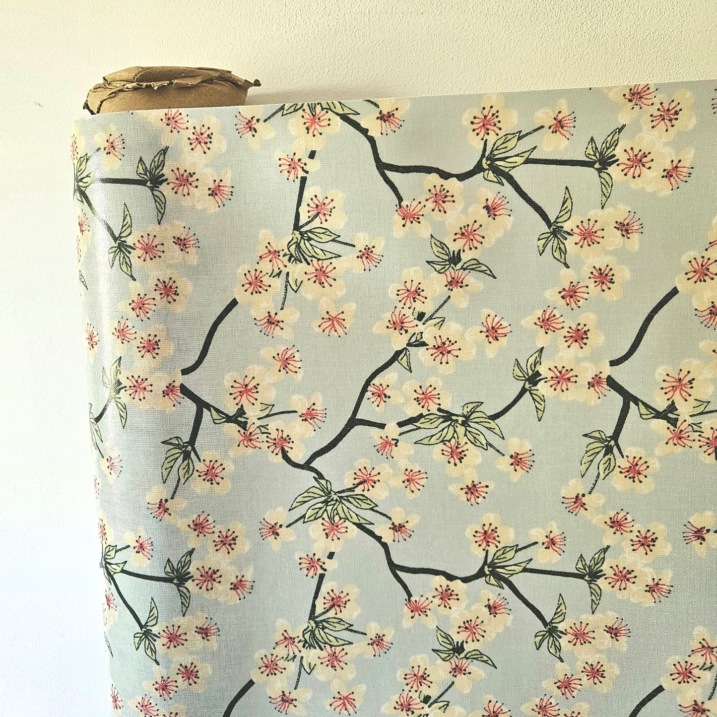 AU MAISON Wachstuch Amalie Light Blue Kirschblüten hellblau pastellblau, beschichtete Baumwolle