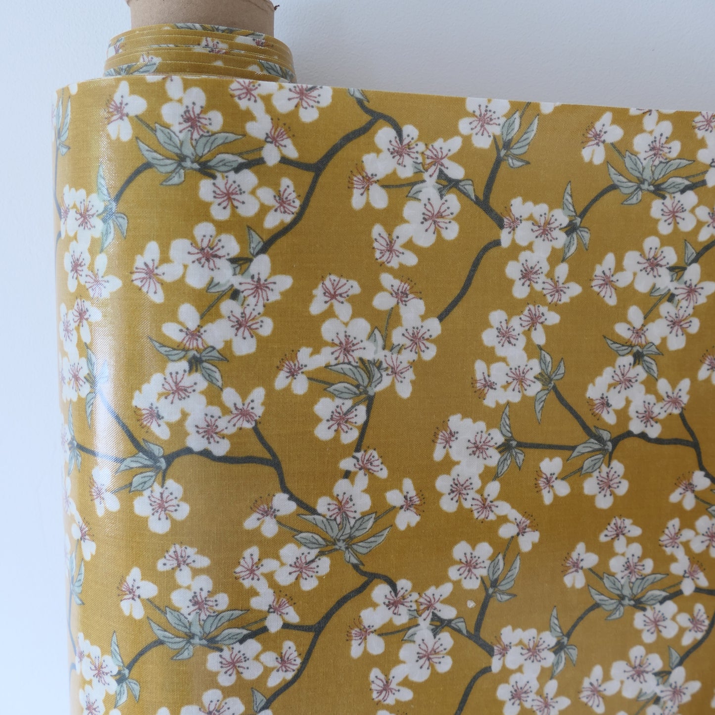 AU MAISON Wachstuch Amalie Mustard Senfgelb Kirschblüten, beschichtete Baumwolle