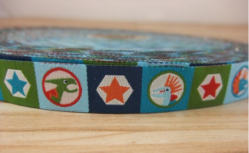 Woven ribbon DINOPUNKS by Farbenmix - Cool dinosaurs on a blue-green ribbon